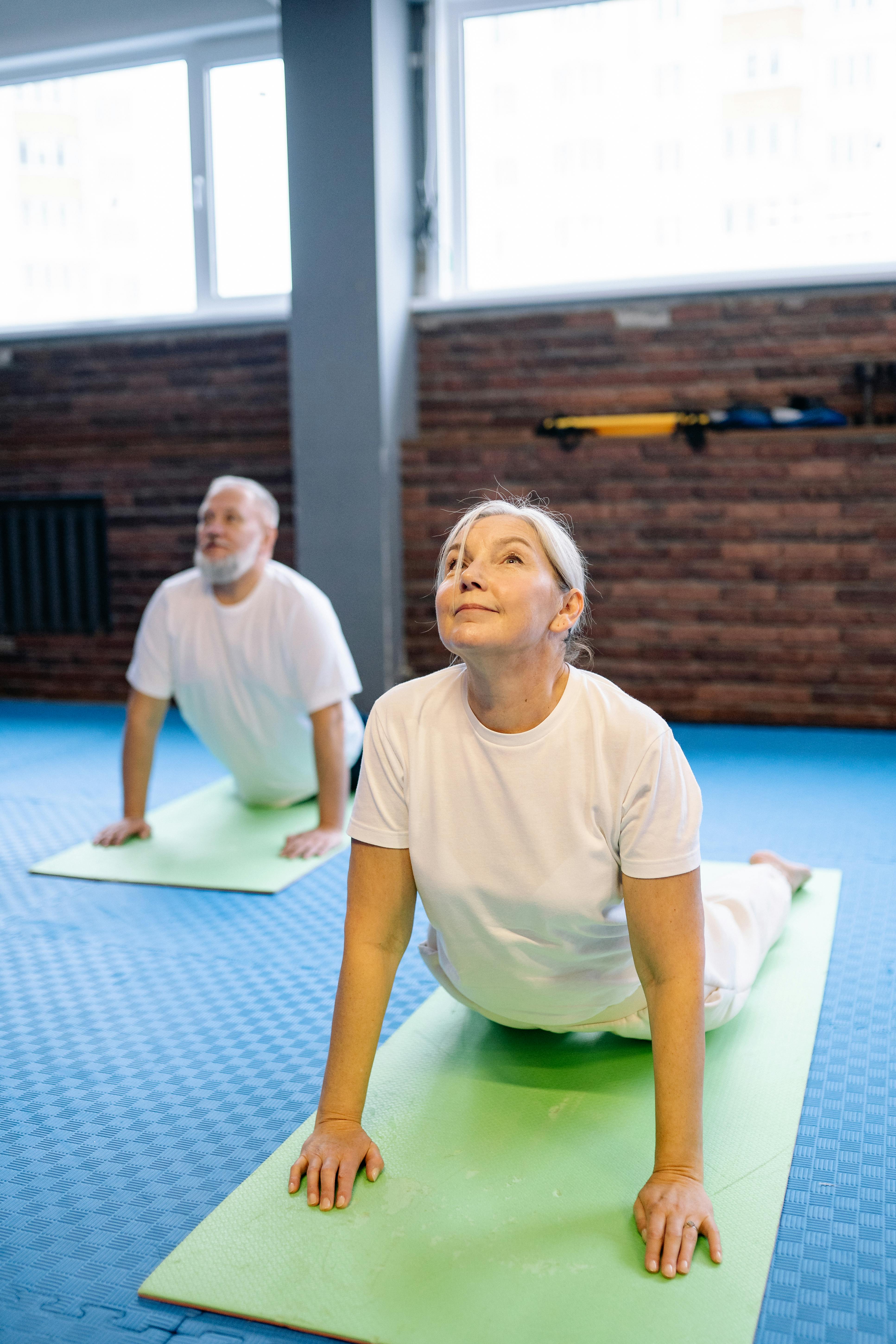 Seniors doing yoga